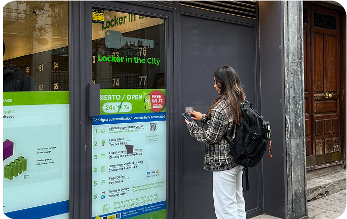 Photo of the storage facility at Plaza Mayor, Madrid with a user entering the access code at the entrance