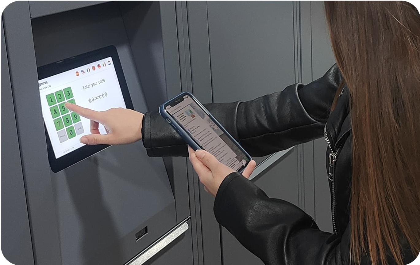 Photo of the storage facility at Praia da Rocha | Fortaleza de Santa Catarina, Portimao with a person using the screen to open their locker