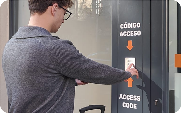 Photo of the storage facility at Santos, Lisbon with a user entering the access code at the entrance