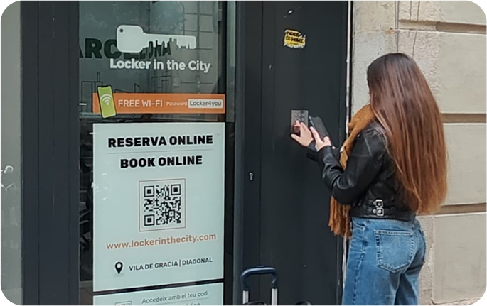 Photo of the storage facility at Vila de Gràcia, Barcelona with a user entering the access code at the entrance